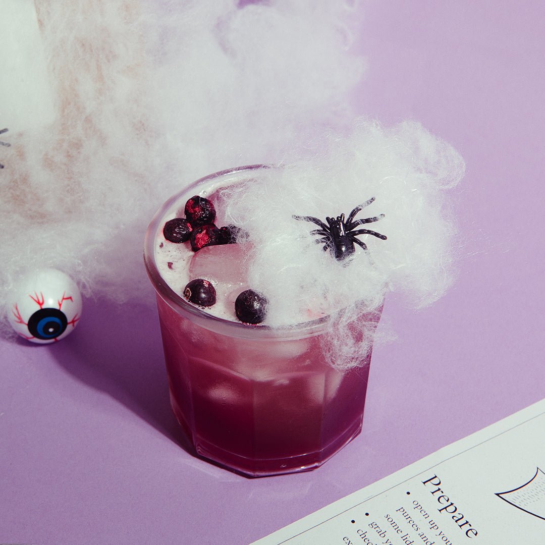 Small Black Plastic Spiders Garnish from Cocktail Garnishes UK